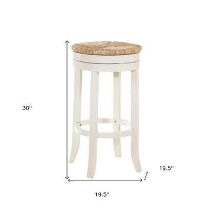 HomeRoots 30 Natural And Antiqued White Solid Wood Swivel Backless Bar Height Bar Chair With Footrest - 19.5